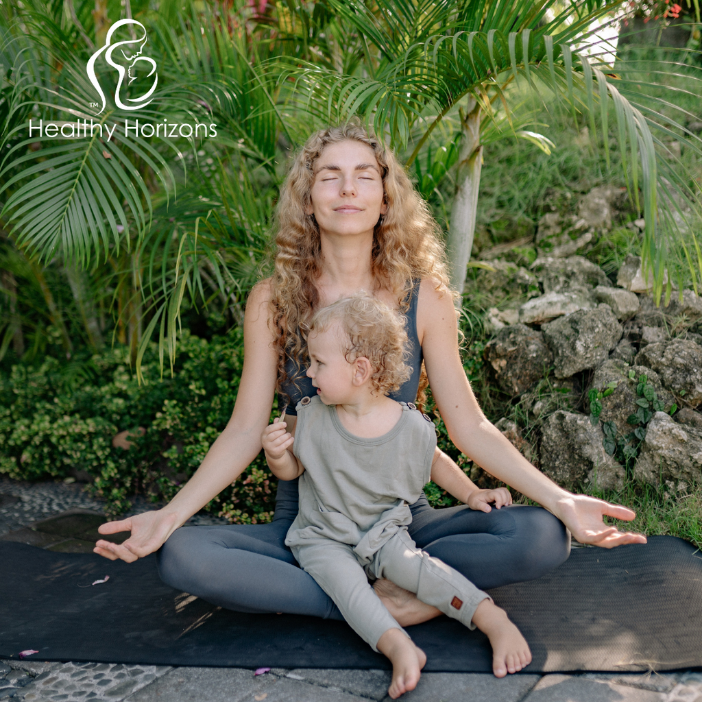 Mom with young child doing mommy-and-me yoga 