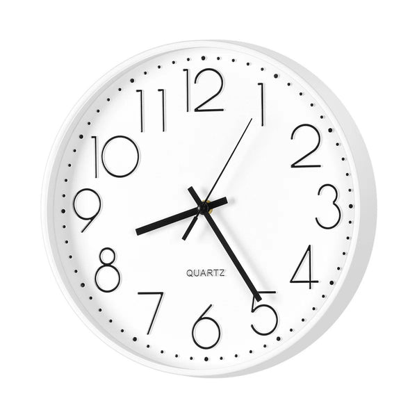 A minimalist white quartz wall clock with black Arabic numerals, black hands, and a thin white frame, shown against a plain white background.